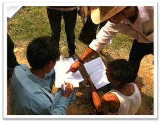 Figure 3: Field assistant help resident to fill the DSS survey form